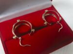 Goldene Ohrringe 14 Karat mit Besatz