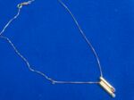 Goldene UNOAFERRE Kette mit Anhänger - Edelsteine