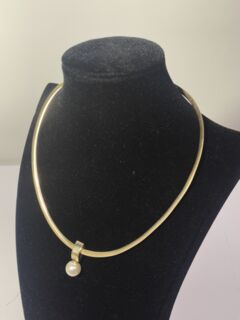 Omega Wende Collier Gold / Silber mit Perle